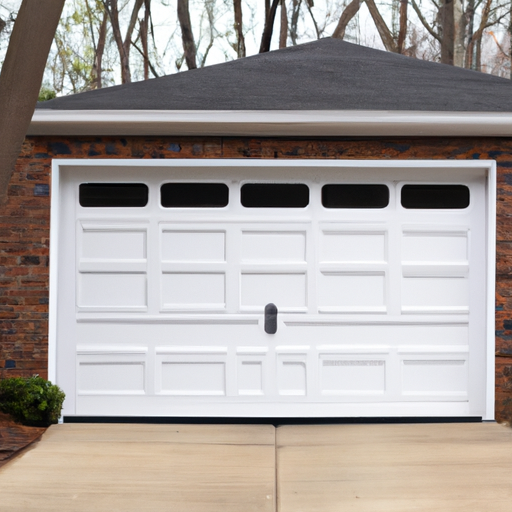 Suburban Princeton home with a visible modern garage door on a quiet street, no people.